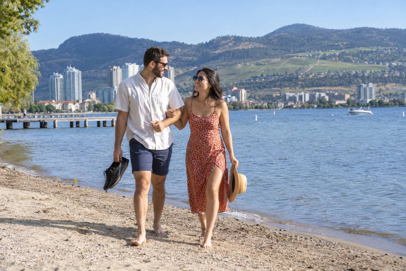 Couple on an Okanagan Lake beach in Kelowna